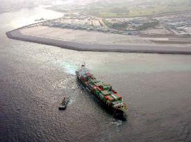 Ship runs aground near Naha airport, blocking planes